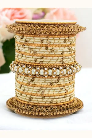 Leshya Set Of 31 Brass Plated Stones Studded & Beaded Thread Bangles