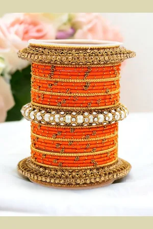 Leshya Set Of 31 Brass Plated Stones Studded & Beaded Thread Bangles