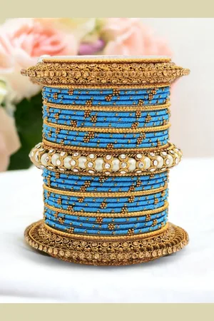 Leshya Set Of 31 Brass-Plated Stone Studded Bangles