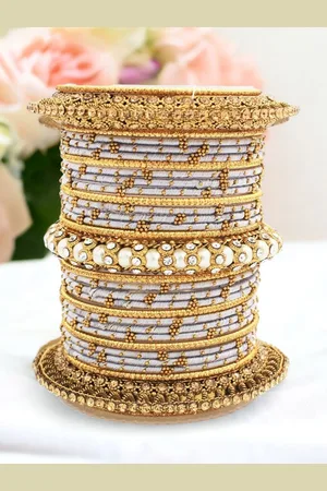Leshya Set Of 31 Brass Plated Stone Studded Bangles