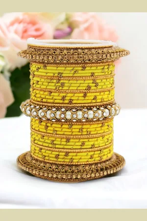 Leshya Set Of 31 Brass Plated Stones Studded & Beaded Thread Bangles