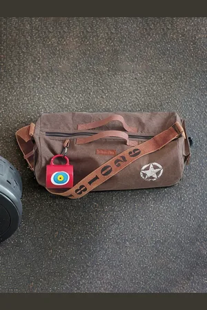The House of Tara Unisex Brown Duffel Bag