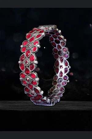 Adwitiya Collection Silver-Plated Stone-Studded Flower Pattern Oxidised Bangle
