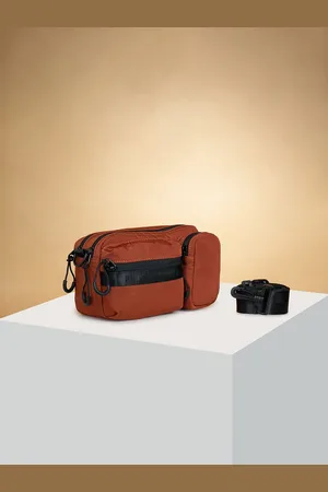 Pantaloons Structured Sling Bag with Cut Work