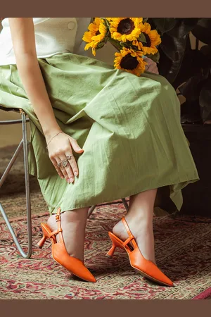SAINT G. Pointed Toe Leather Kitten Slingback Heeled Pumps