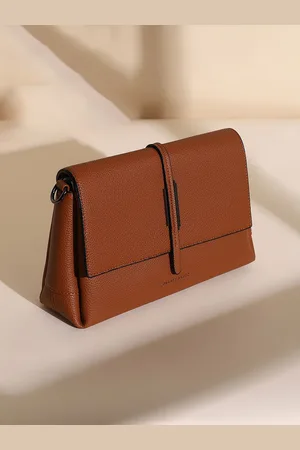 Campus Sutra Leather Swagger Sling Bag with Bow Detail