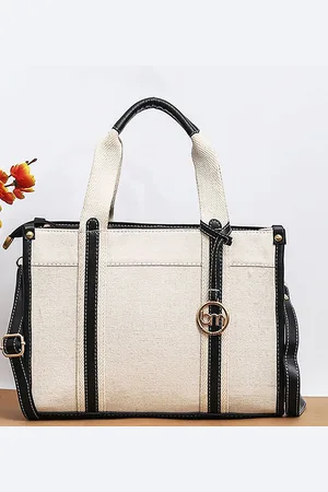 Bagsy Malone Women Textured Solid Structured Satchel Bag