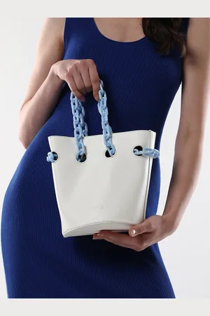 Campus Sutra Women Colourblocked Leather Bucket Handheld Bag with Tasselled