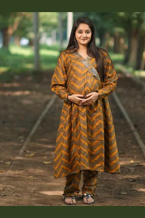 Aujjessa Women Angrakha Sequinned Kurta with Trousers