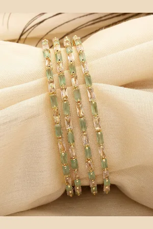 karatcart Set Of 4 Gold Plated American Diamond Stone Studded Bangles