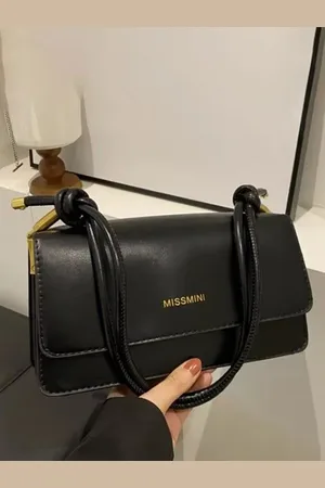 Stylecast Textured Structured Handheld Bag with Tasselled