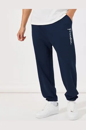 Styli Men Navy Blue Typography Printed Relaxed Fit Joggers Track Pants