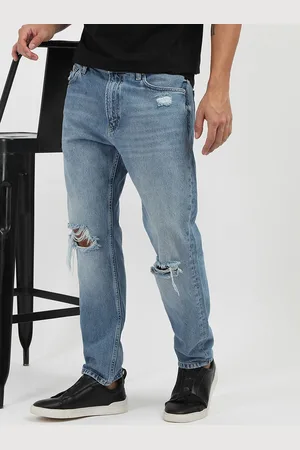 Calvin Klein Men Mildly Distressed Light Fade Jeans