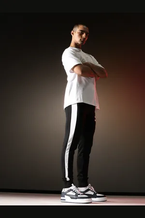 PUMA Men Black & White Striped Iconic T7 Slim-Fit Joggers
