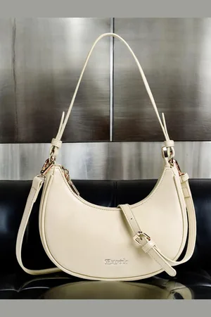 EXOTIC Women Solid Half Moon Sling Bag