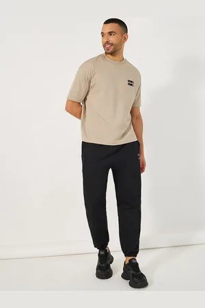 Styli Minimal Graphic Mock Neck Oversized T-Shirt With Joggers