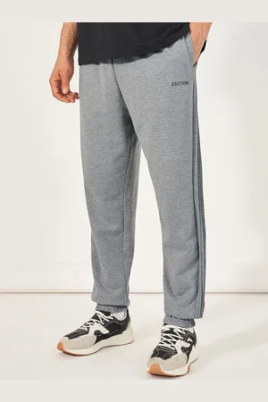 Styli Men Side Pintucks Oversized Fit Joggers with Embroidered Detail