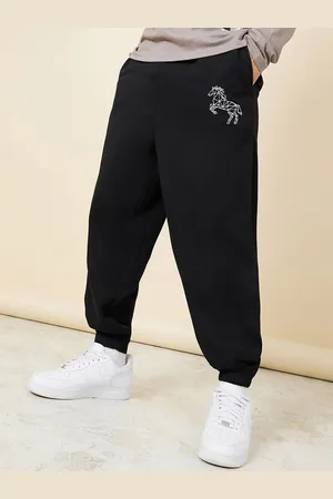 Styli Men Black Mid-Rise Embroidery Oversized Pure Cotton Joggers