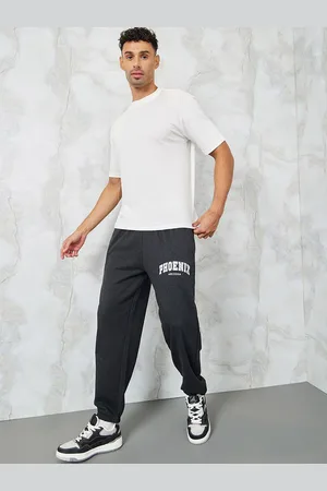 Styli Men Embroidered City Name Relaxed Terry Joggers
