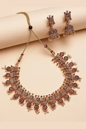karatcart Gold-Plated Kundan Studded Laxmi Mata and Floral Temple Necklace and Earrings