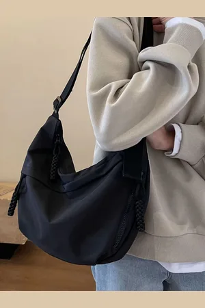 Stylecast Half Moon Hobo Bag with Tasselled