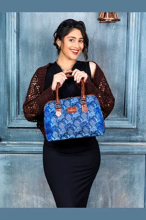 THE CLOWNFISH Montana Ethnic Motifs Printed Bowling Handheld Bag with Tasselled