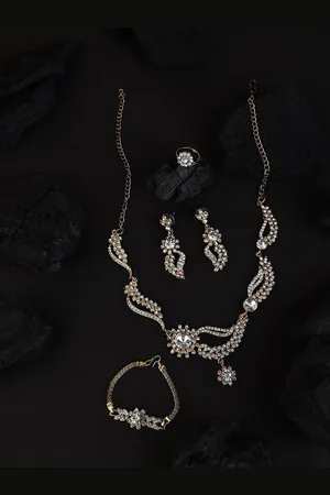 Anouk Gold-Plated Artificial Stones-Studded Necklace And Earrings With Bracelet And Ring