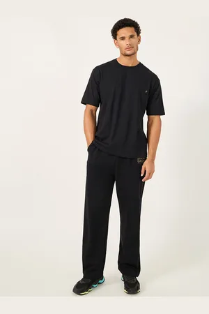 Styli Thevasa Oversized Fit Slogan Printed T-Shirt & Jogger Training Set