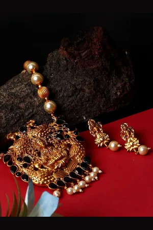 Anouk Gold Plated Goddess Laxmi Black Stone Studded Temple Jewellery set
