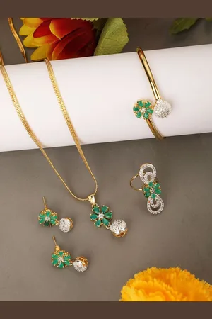 Anouk Gold Plated American Diamond Studded Pendant Earrings Bracelet and Ring