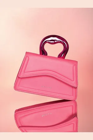 Campus Sutra Leather Swagger Handheld Bag with Applique