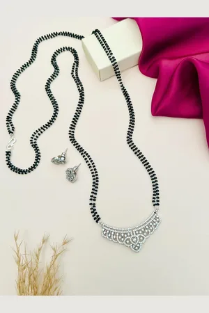 ABDESIGNS Silver-Plated American Diamond Studded & Beaded Mangalsutra With Earrings