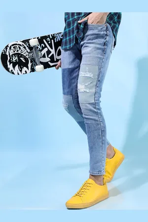 Highlander Men Blue Tapered Fit Mildly Distressed Heavy Fade Stretchable Jeans