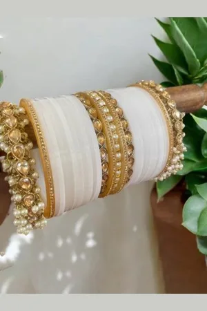 Leshya Set Of 29 Stone Studded & Beaded Rajasthani Bridal Chura & Gajra Kada Bangles