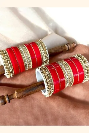 Leshya Set Of 50 Stone Studded & Beaded Rajasthani Bridal Chura & Gajra Kada Bangles