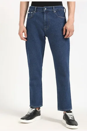 Calvin Klein Men Tapered Fit Low Distress Light Fade Stretchable Jeans