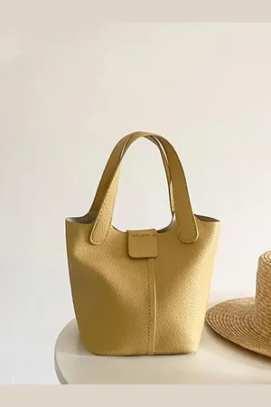 Stylecast Half Moon Handheld Bag with Cut Work