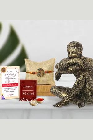 eCraftIndia Gold-Toned Man Sitting in Thinking Position Statue Peacock Rakhi Gift Set