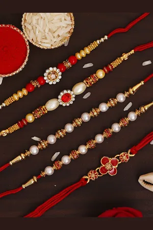 eCraftIndia Set of 5 Red & Gold-Toned Pearl Designer Rakhi with Roli Chawal Pack