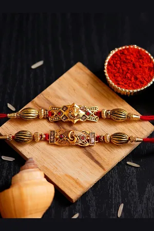 eCraftIndia Set of 2 Red & Gold-Toned Rakhi with Roli Chawal