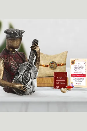 eCraftIndia Multicoloured Peocock Rakhi With Man Playing Guitar Statue Gift Set
