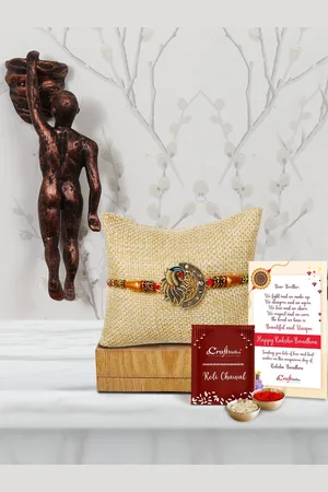 eCraftIndia Gold-Toned & Copper-Toned Man Idol with Rakhi Gift Set