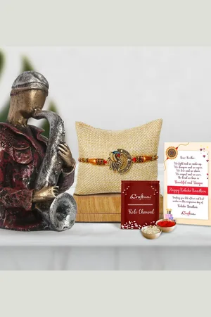 eCraftIndia Gold-Toned & Red Man with Hat Playing Trumpet Statue Rakhi Gift Set