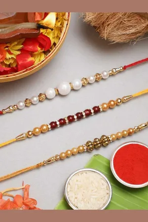 eCraftIndia Set of 3 Pearl Beaded Rakhis with Roli Chawal