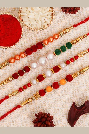 eCraftIndia Set of 4 Multicoloured Designer Pearl Rakhi with Roli Chawal
