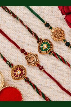 eCraftIndia Set Of 4 Red & Gold-Toned Studded Rakhis