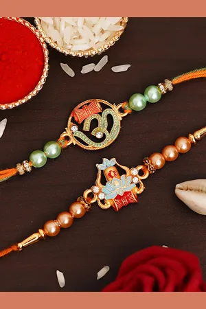 eCraftIndia Pack of 2 Designer Rakhis and Roli Chawal Pack
