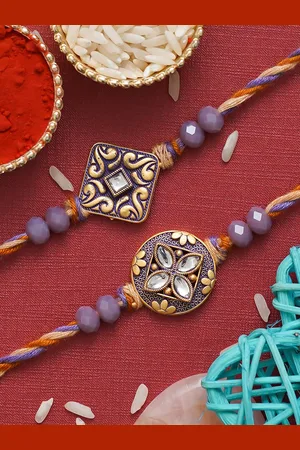 eCraftIndia Set Of 2 Stone Studded Thread Rakhis With Roli Chawal