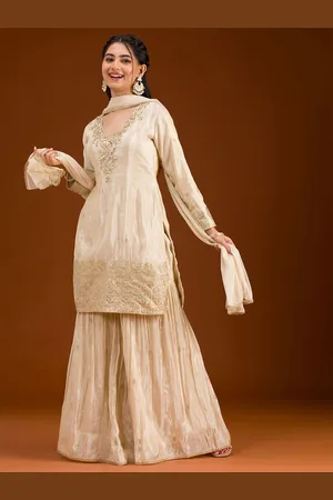 Koskii Women Floral Embroidered Regular Sequinned Kurta with Sharara & With Dupatta