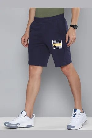PUMA Men Navy Blue Brand Logo Printed Slim Fit Sports Shorts